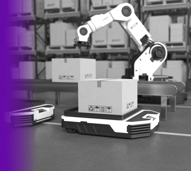 A robotic arm places a box onto an autonomous mobile robot in a warehouse