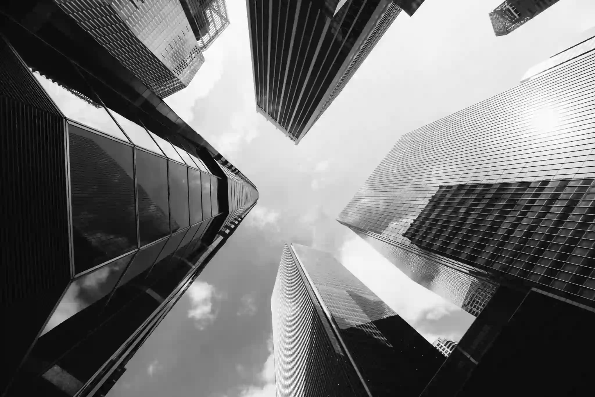 Upward view of financial district skyscrapers against the sky