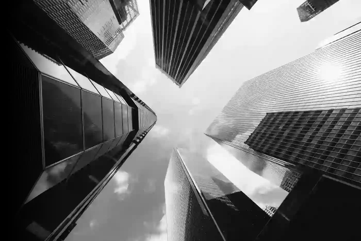 Upward view of financial district skyscrapers against the sky